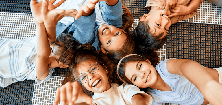 children learning in a classroom.
