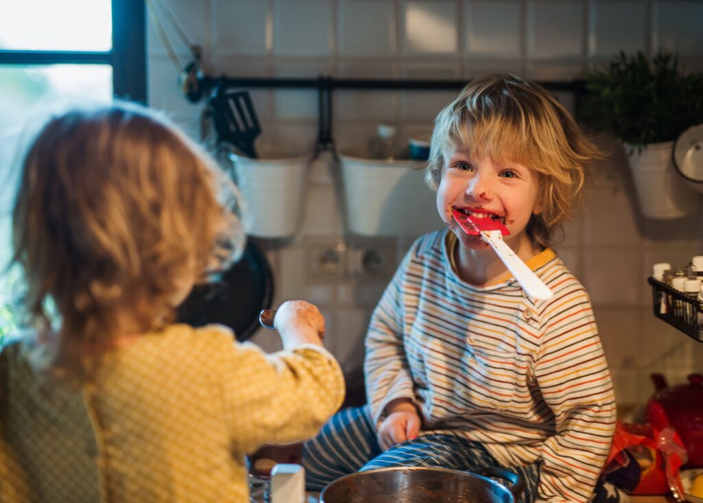 Boy and girl in kitchen.